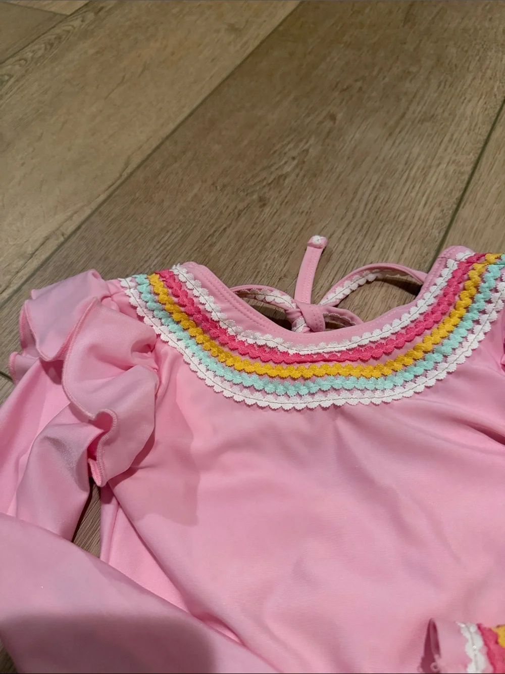 Kids Pink Ruffle One-Piece Swimsuit with Rainbow Trim. No flaws.